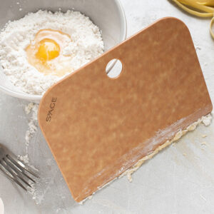 Sage Scraper Tool next to a bowl with egg and flour in it.