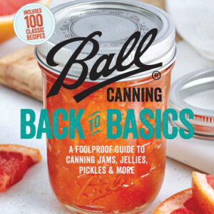 Ball Canning Back to Basics book cover featuring a mason jar of preserved citrus